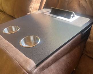 Middle folds down for drink holders, usb ports and electric outlets