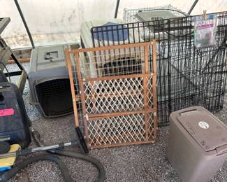 Lots of Dog items.  Kennels and gates