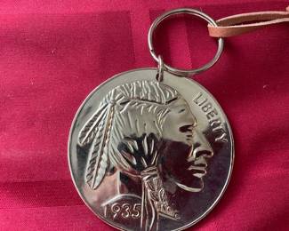 Nickle coin pendant. 