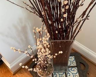 Vases with dried flowers.