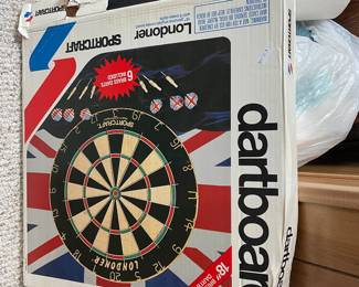 Dartboard in box.