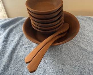 Set of wooden bowls with spoons.