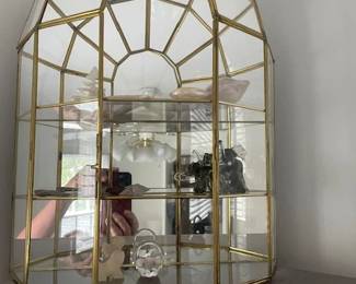 Glass curio cabinet.