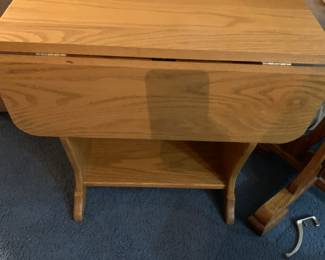 Coffee table with fold up sides 