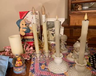 Various candles and precious moments 