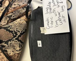 #136	Coach Logo Fabric Shoulder Bag w/patent leather trim and dust bag	 $40.00 
