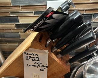 #213	Set of Henkels Knives (as is (missing few)	 $60.00 
