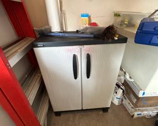 #155	Black and Decker cabinet with 2 shelves 27x15x36	 $75.00 
