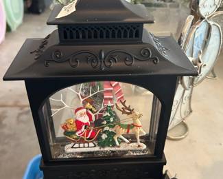 #179	Raz Imports Lighted Snowman Lantern Snow globe	 $30.00 
