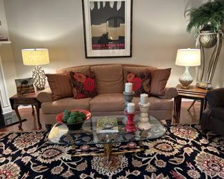 #6	Ethan Allen tan fabric loose back sofa 88 long	 $200.00 sold
#7	glass top brass base coffee table 51x24x17	 $75.00 
