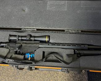 Ruger precision 6.5 rifle with tripod case and scope