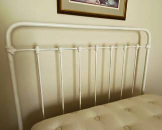 antique iron bed with headboard and footboard