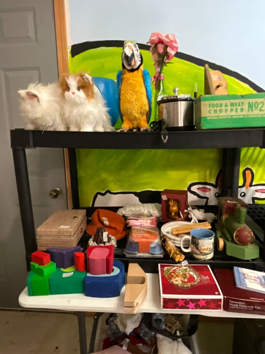 Upstairs -toys. - family removed items on table at left front
