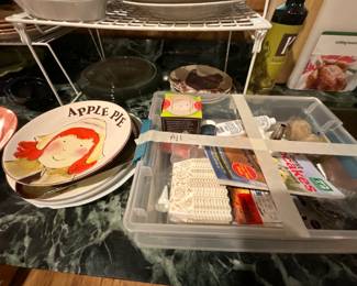 Kitchen - pie plates, large container of miscellaneous