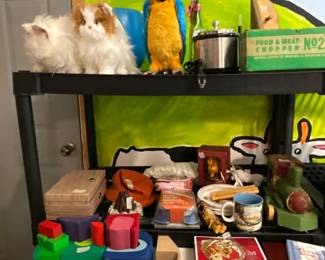 Upstairs -toys. - family removed items on table at left front