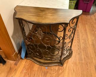 Ornate side table with iron