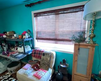 Upstairs - item between chair & cabinet removed by family