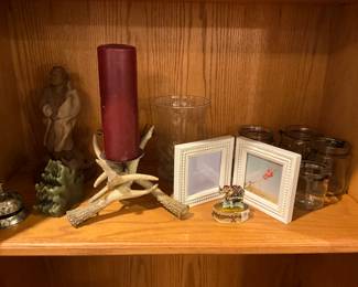 Decor in wall unit - candle in horns removed by family