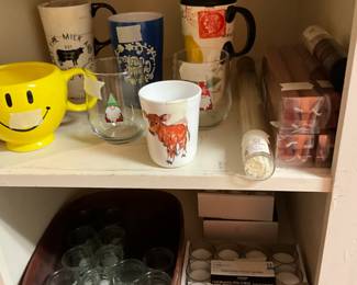 Laundry room - lots of cups - cow cup in front removed by family