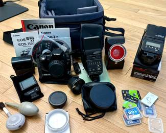Lots of camera equipment and accessories 