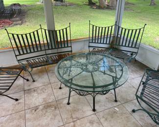 Absolutely gorgeous 7 piece wrought iron, green, scrolled detail patio set. Cushions included.