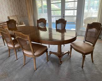 Dining room table (shown with 2 leaves), 6 chairs and pads. Table measures 66" with (2) 18" leaves