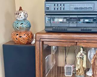 Panasonic stereo system with two speakers and stereo cabinet