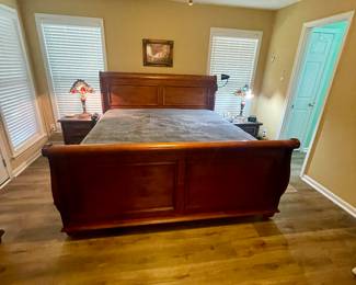 King sleigh bed two night stands and Tiffany style lamps