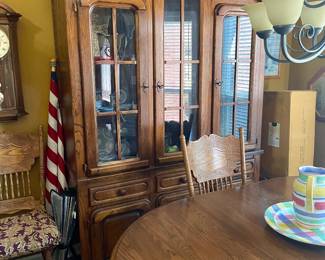 Wood Oak China cabinet and wood dining table with six chairs