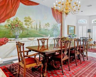 Solid wood dining room table with eight chairs. Has two leafs