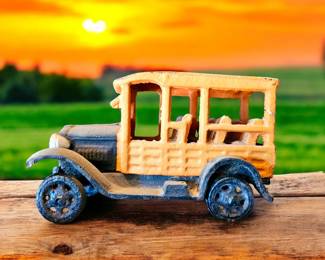 Cast iron orange and black cab