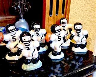 Six piece football salt and pepper shaker set. Sold as set