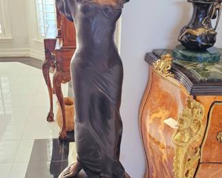 Bronze woman carrying water vase. Pedestal sold separately 