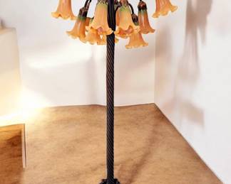 Tiffany style copper on bronze lamp. Boasts 12 lights