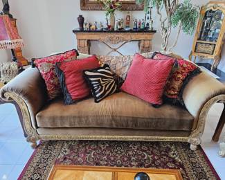 Velvet sofa. Has major sun damage