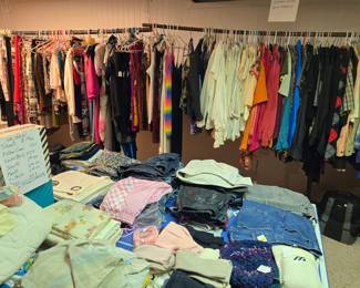 Basement, Ping-Pong Rm.  Women's clothes 12-14. Some men's clothes.  Everything in this room 50% off price marked!