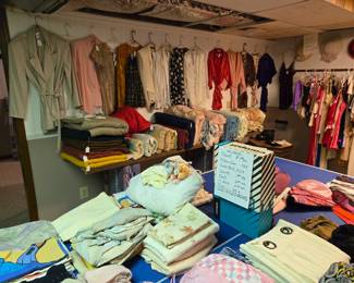 Basement, Ping-Pong Rm.  Blankets, bedding, Clothing And of course the Pin-Pong table.  :)   Everything in this room 50% off price marked!