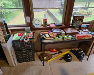 Sun Room.   Games and toys.  Everything in this room 50% off price marked!