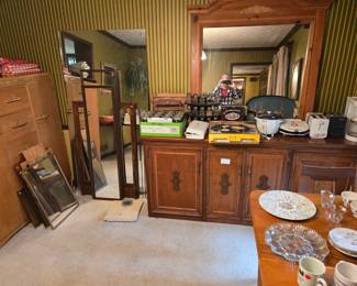 Dinning Rm.  A number of large mirrors.  Hand made Counter with cabinets. Everything in this room 50% off price marked!