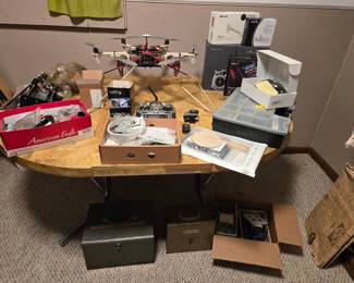 Basement, Study.  Large DJI Hexacopter, with tones of accessories, spare parts and tools.  Everything on the table and under it goes with it.   Everything in this room 50% off price marked!