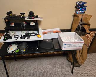 Basement, Office.  Web Cams, Mice, Phone battery packs(for power backup). Golf Club Set, balls & Tees.  Everything in this room 50% off price marked!