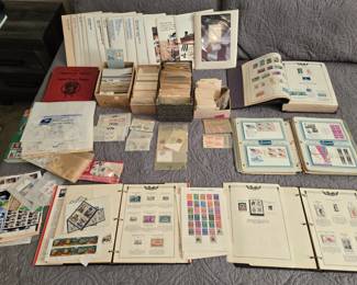 Larger US Stamp Collection, Including 14 Mint Sets(top) starting with 1975.   Also 2 packed Scott Minuteman Albums.  1 from 1851 to 1969, the other from 1970 to 1990.