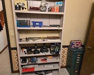 Basement, Office.   Antique Drafter Sets and tools. Joysticks, Laser with Red notebook of info.  Everything in this room 50% off price marked!