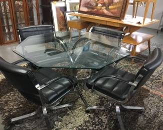 Glass and metal table with 4 chairs - $350/set