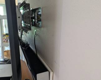 Back of TV shows mount and sound bar.