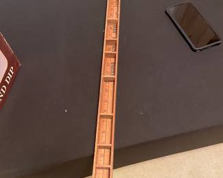 Very unique yardstick with compartments 