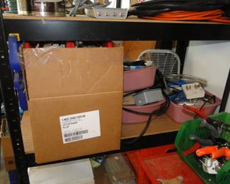 Bins, and buckets, and shelving filled with tools