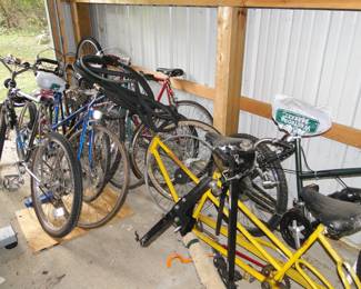 Bikes, all different bikes in various conditions, and bike parts too