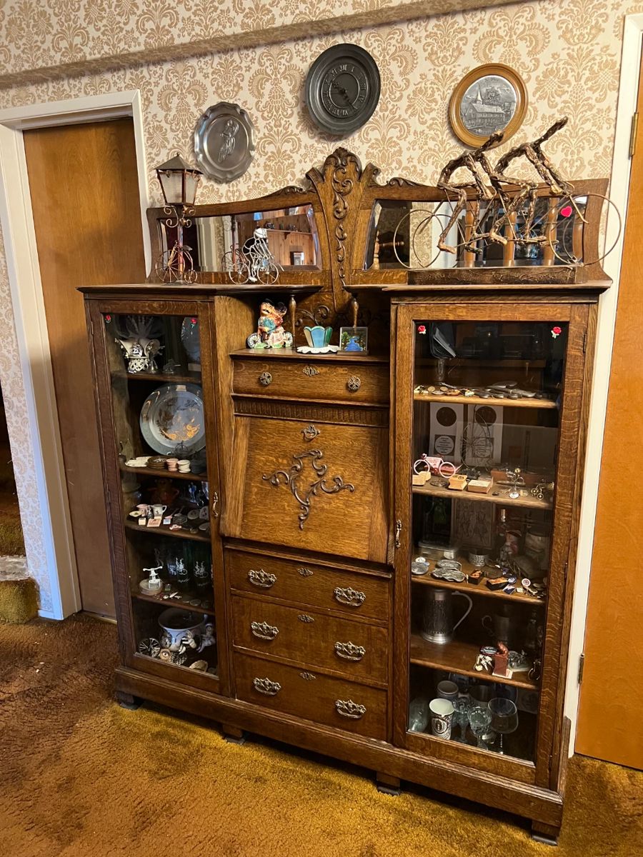 This is an exquisite piece, part secretary's desk, part display cabinets.  