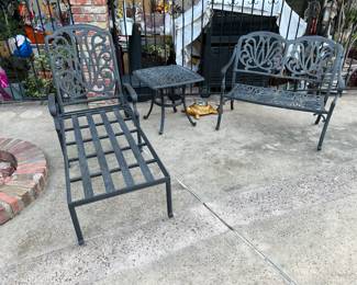 Or this loveseat, table, and chaise lounger set.